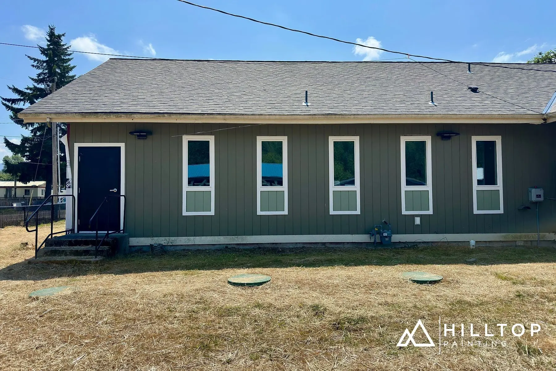 Re-Sided, Repaired & Repainted — a Deming Commercial Building in Sage Green — photo 8