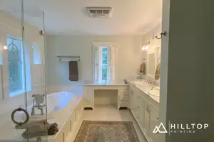 A White Farmhouse Kitchen & Its Matching Bath — Early Bellingham Cabinet Work That Still Holds Up — Bellingham, WA 98226