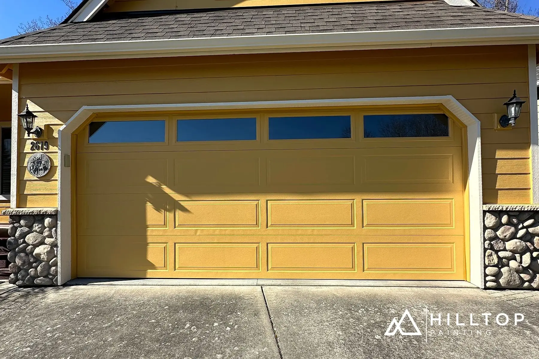 Butter-Yellow Kept Warm — a Bellingham Stone-Front Cottage & Its Garage Doors — photo 3