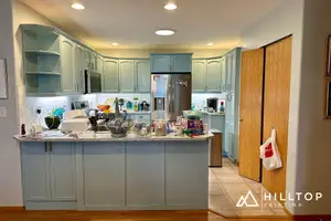 Golden Oak to a Soft Blue-Green — a 35-Door Bellingham Cabinet Repaint — Bellingham, WA 98226
